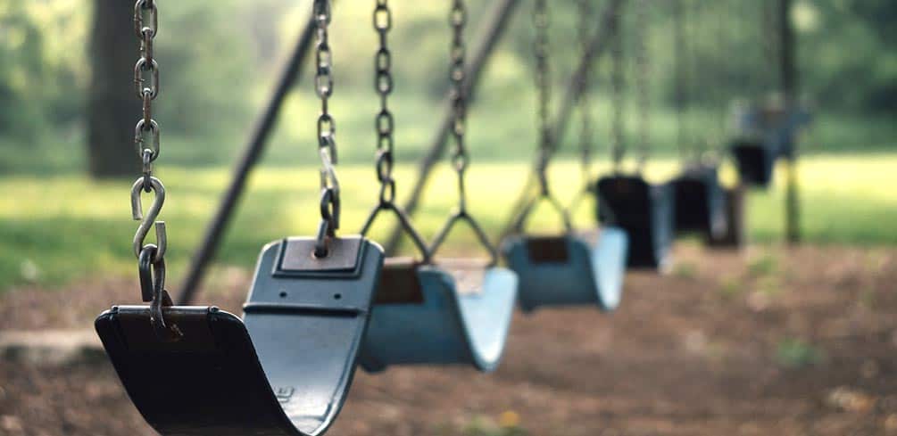 Are Metal or Wood Swing Sets Better? Metal vs Wooden Swing Sets