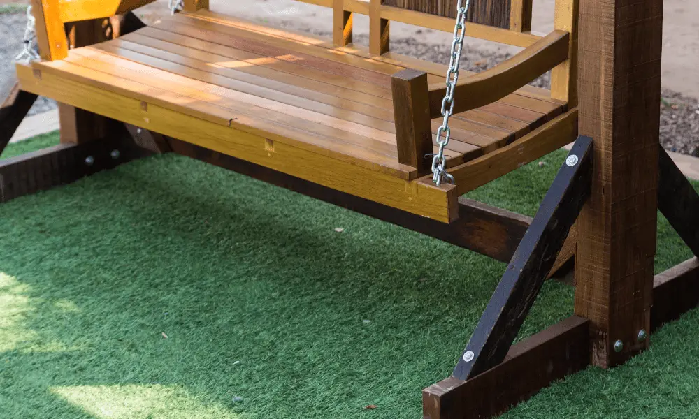 How to Anchor Swing Sets to Artificial Grass